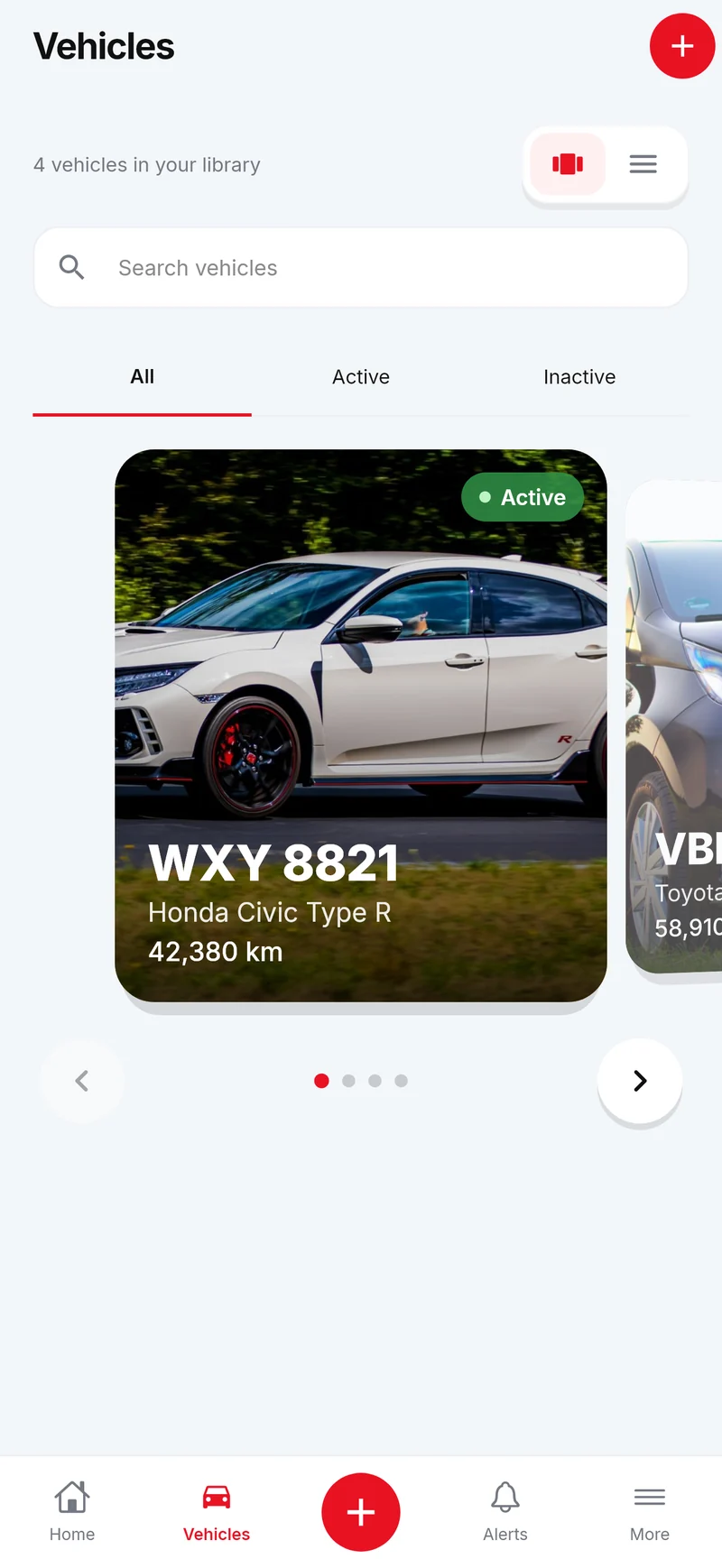 Vehicles shown as cards with a photo, plate and odometer